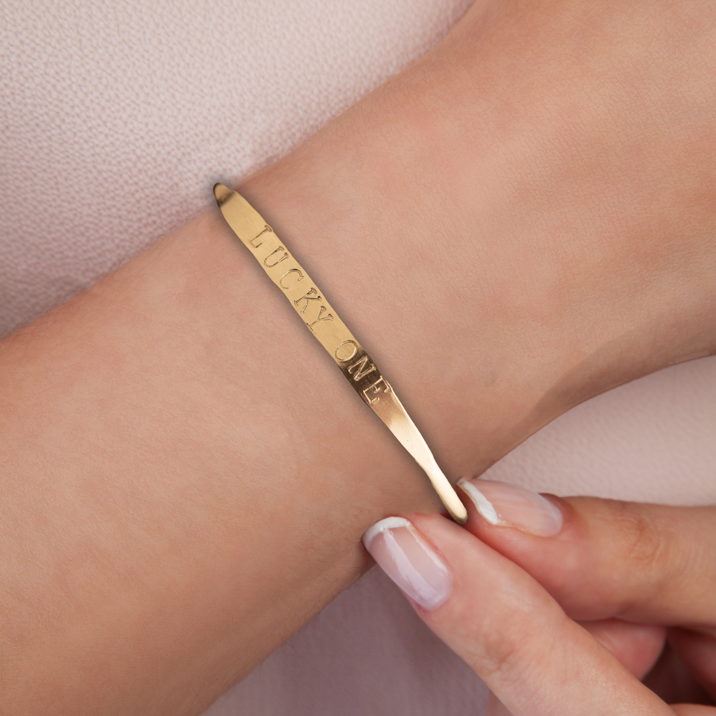 bracelet with Lucky One engraved